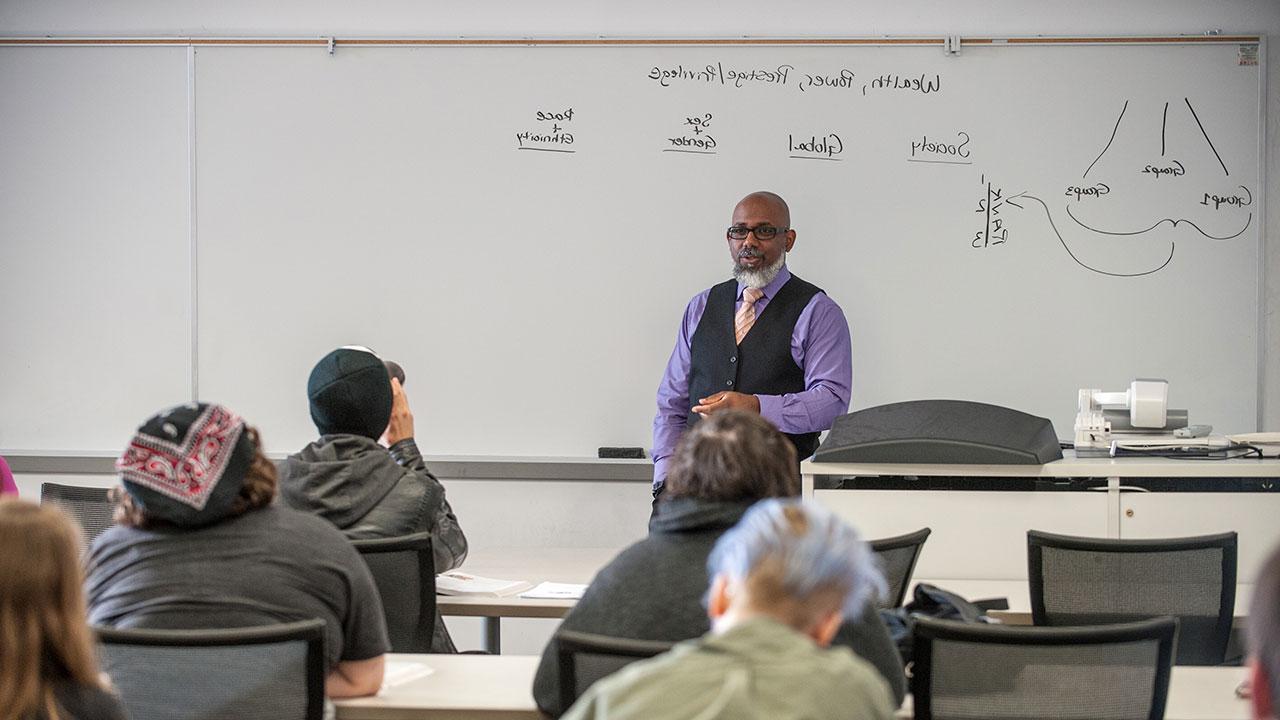 Rob Shelby teaching a sociology class